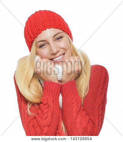 Lovely beautiful blonde in red winter clothes luxuriates wrapped in a scarf. Isolated on white background