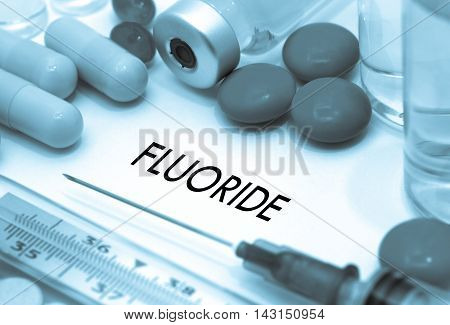 Fluoride. Treatment and prevention of disease. Syringe and vaccine. Medical concept. Selective focus