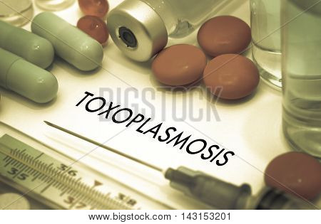 Toxoplasmosis. Treatment and prevention of disease. Syringe and vaccine. Medical concept. Selective focus