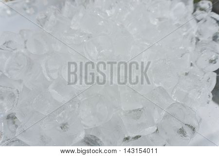 The texture of the ice cubes, frozen cubes of ice. Cocktail ice