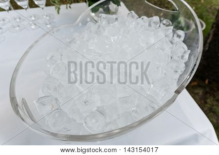 The texture of the ice cubes, frozen cubes of ice. Cocktail ice