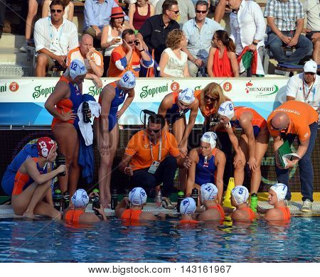 Budapest, Hungary - Jul 16, 2014. Netherland's HAVENGA Arno head coach talking about the tactics. The Waterpolo European Championship was held in Alfred Hajos Swimming Centre in 2014.