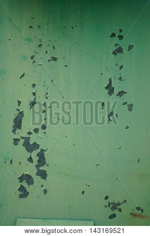 old metal green wall with rust crac