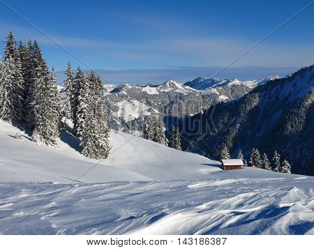 Winter landscape in Gstaad Switzerland. View from Mt Wispile.