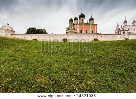 The historic Goritsky monastery in Pereslavl, walls and churches stand on a green slope