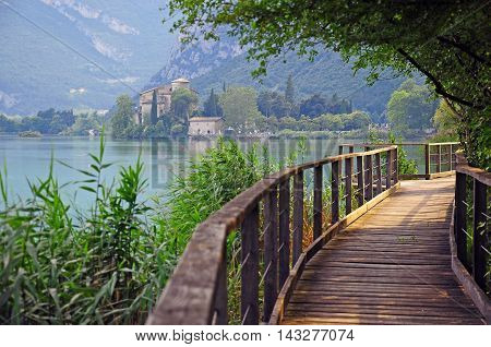 The stealing beauty: old castle and wooden path in Trentino Alto Adidge Italy