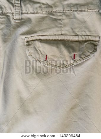 Close-up of a back pocket on a pair of khakis