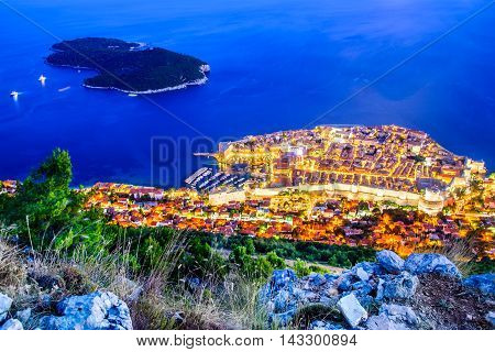 Dubrovnik Croatia. Spectacular twilight picturesque view on the old town medieval Ragusa and Lokrum island on Dalmatian Coast.