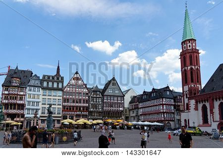 FRANKFURT AM MAIN GERMANY - AUGUST 7 2015: Romerberg square (Roman Mountain) the historic heart of the city and the centre of the old town.
