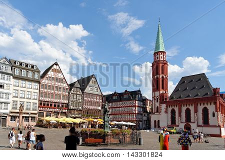 FRANKFURT AM MAIN GERMANY - AUGUST 7 2015: Romerberg square (Roman Mountain) the historic heart of the city and the centre of the old town.