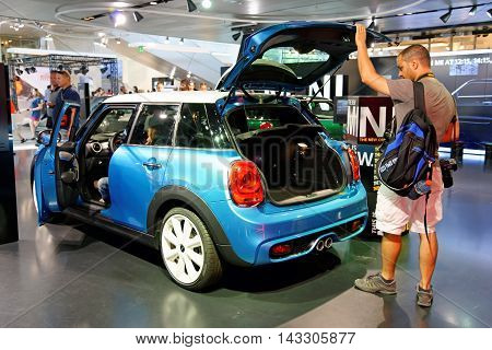 MUNICH GERMANY - 4 AUGUST 2015: The new MINI S with twinpower turbo engine presented at BMW World showroom in Munich Germany.