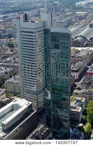 FRANKFURT AM MAIN GERMANY - AUGUST 6 2015: Aerial view of Silberturm (Silver Tower) with main tenant Deutsche Bahn and Skyper skyscraper. Frankfurt is the largest financial centre in continental Europe.