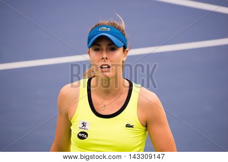 Mason Ohio - August 13 2016: Alize Cornet in a qualifying match at the Western and Southern Open in Mason Ohio on August 13 2016.