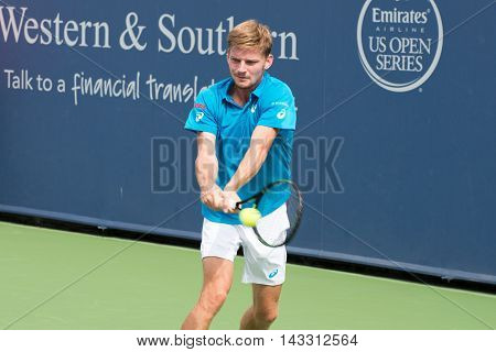 Mason Ohio - August 16 2016: David Goffin in a match at the Western and Southern Open in Mason Ohio on August 16 2016.