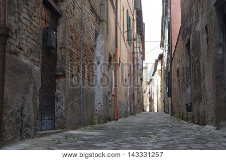 Urbania, Italy - August, 1, 2016: street in an ancient part of Urbania, Italy 