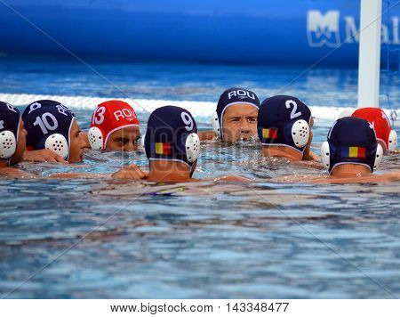 Budapest, Hungary - Jul 17, 2014. Romania preparing for the battle-cry. The Waterpolo European Championship was held in Alfred Hajos Swimming Centre in 2014.