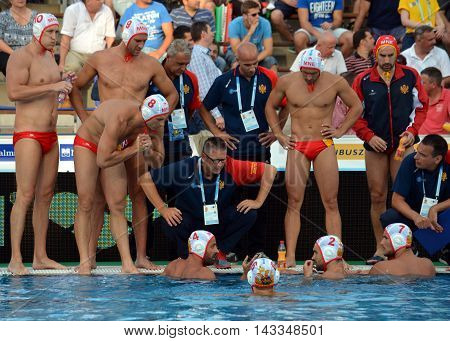 Budapest, Hungary - Jul 17, 2014. Montenegro's PEROVIC Ranko head coach talking about the tactics. The Waterpolo European Championship was held in Alfred Hajos Swimming Centre in 2014.