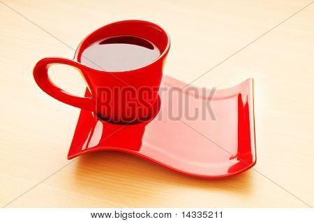 Tasse de thé sur le fond en bois