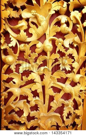 the beautiful gold of pattern Lai Kanok (Thai design) in wood