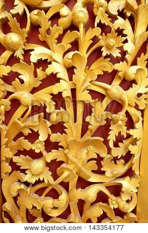 the beautiful gold of pattern Lai Kanok (Thai design) in wood