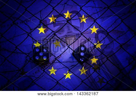 50 euros banknotes, dices, cracks fence an EU flag