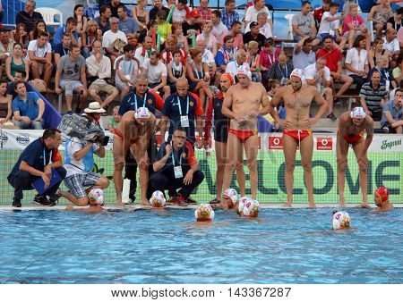 Budapest, Hungary - Jul 17, 2014. Montenegro's PEROVIC Ranko head coach talking about the tactics. The Waterpolo European Championship was held in Alfred Hajos Swimming Centre in 2014.