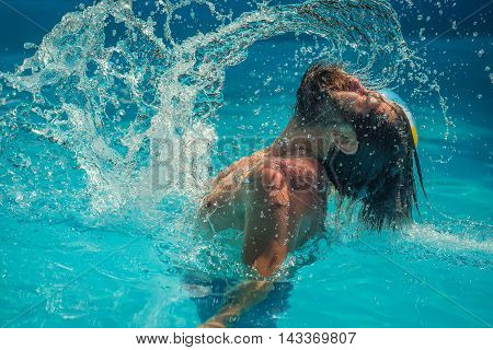 Young Man Splashing Water