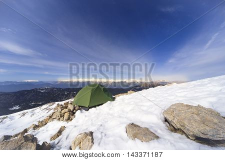 Camping on the top of the mountain in winter.