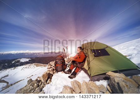 Camping on the top of the mountain in winter.
