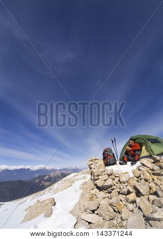 Camping on the top of the mountain in winter.