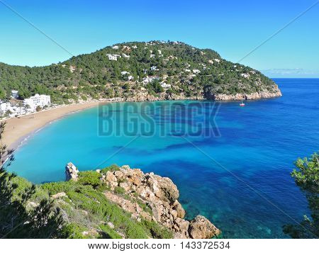 Beach of Cala San Vicent on Ibiza Island, turquoise sea and empty beach.