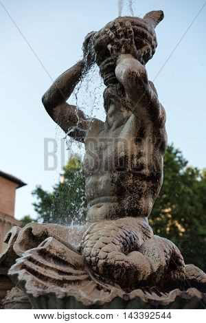 Fountain del Tritone at Piazza Barberini in Rome. Italy