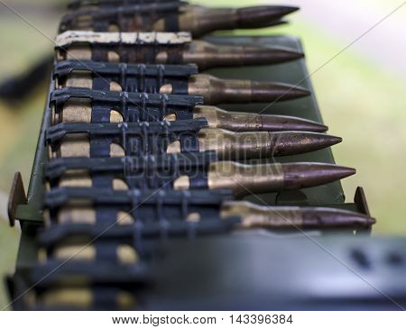 cartridges in cartridge belts with shallow depth of field