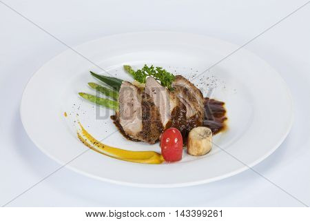 Roasted duck with mashed potatoes caramelized fennel and orange salad and white wine sauce