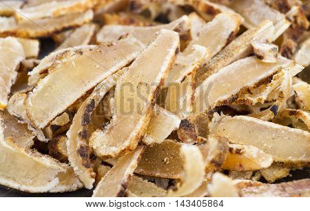 Dried sliced roasted cowskin ready for eat - Northern Thailand traditional food