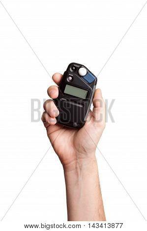 The flash meter in hand on white background