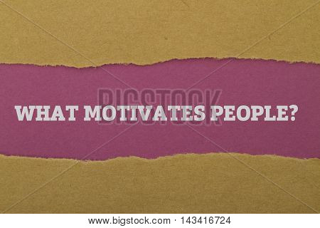 WHAT MOTIVATES PEOPLE? question written under torn paper.