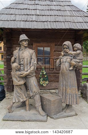 Kolochava Ukraine - April 18 2016: Monument to the villagers - migrant workers who died on earnings in other countries