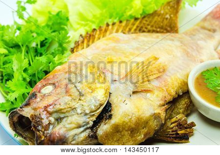 grilled fish Mixed with salt and vetgetable, thai food