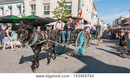 Antique Cart Pulled By A Donkey In The Streets Of The City