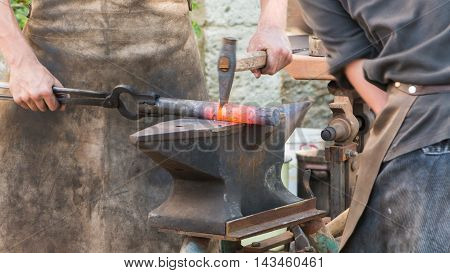 Demonstration By Two Blacksmiths Labor Metal To The Old Way