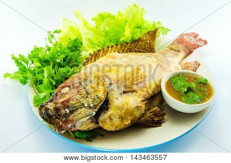 grilled fish Mixed with salt and vetgetable, thai food
