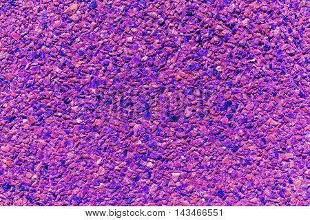 Background from small stones. Granite stone floor or wall background texture. Lessovsky.