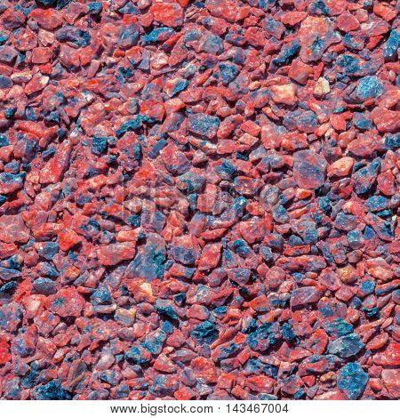 Background from small stones. Granite stone floor or wall background texture. Lessovsky. Lessovsky.