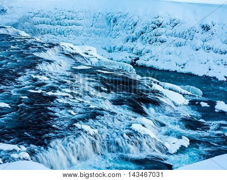 Gulfoss Waterfall of the Golden Circle in heavy snow in Iceland