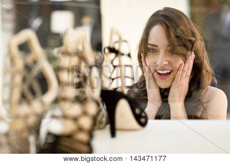 Woman Looking To Showcase Or Shop Window