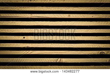 Background with wooden planks stack - Unique background with stacked wooden planks, wonderful details with wood knots and strong lines.
