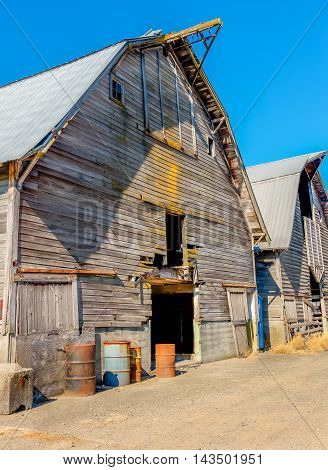 A view of an old weatherbeaten barn in Auburn Washington. HDR image.
