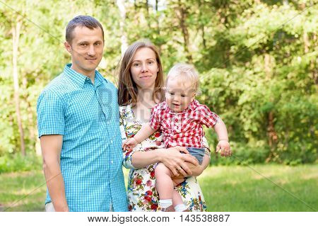 happy family outdoor Symbolize caring and happiness