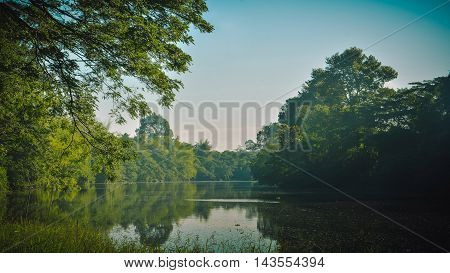 Background river and the beautiful nature and sweatshops.